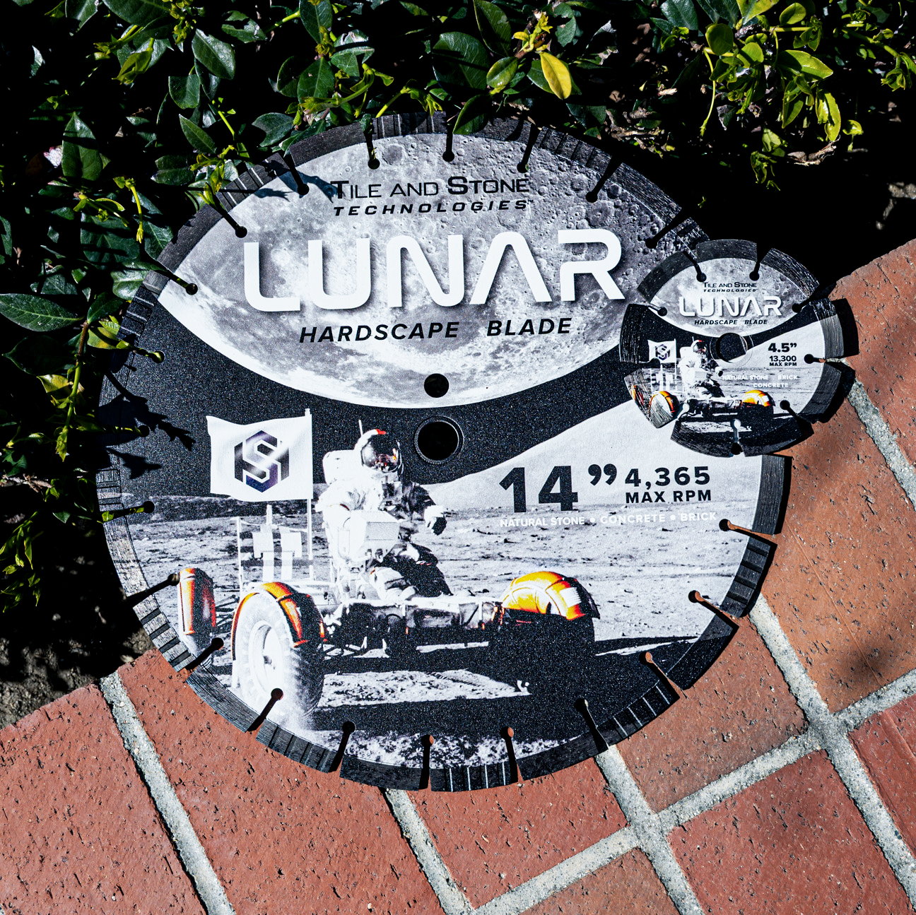 Lunar Hardscape Blade laying on top of bricks