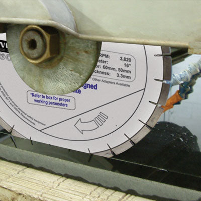 Alpha Tools Silencer III 14-inch diamond blade for hard granite cutting, showing the durable diamond-edged blade in use.