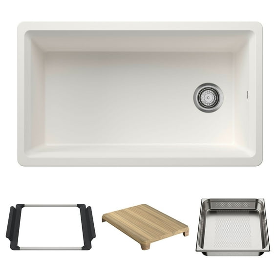 White kitchen sink with accessories including a cutting board, tray, and frame on a white background.
