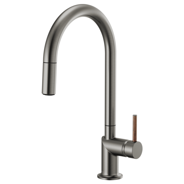Brizo 63075LF single handle bathroom faucet with wood lever handle and stainless steel finish, installed on bathroom sink.